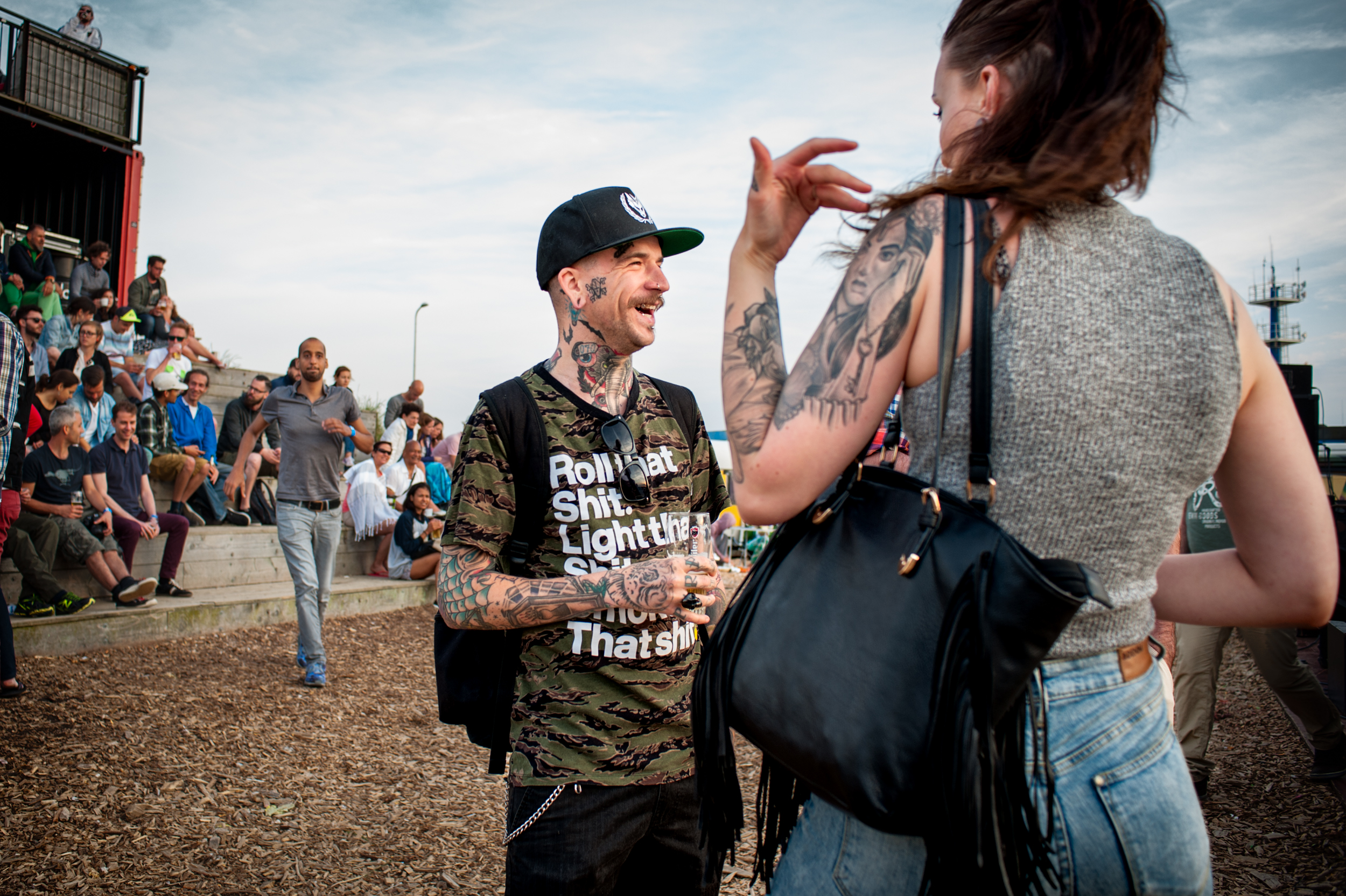two people talking on the festival terrain