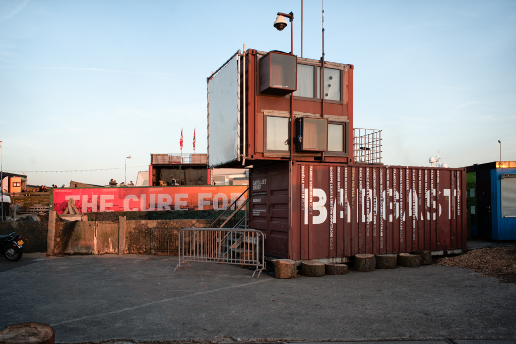 colourful container, serves as a hostel private bedroom.