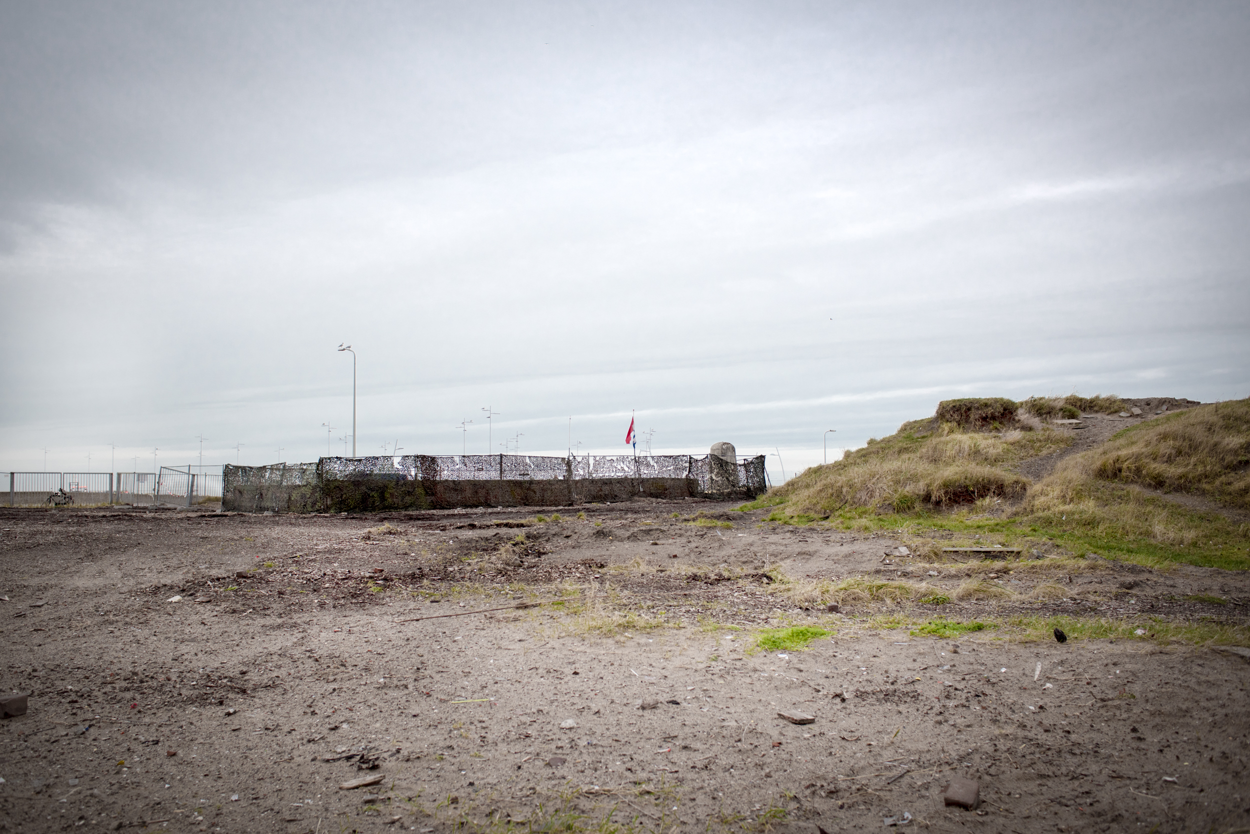 the F.A.S.T. terrain after closure: empty dune landscape under an open sky